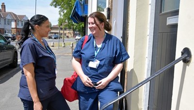 NHS workers outside building