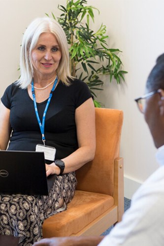 Image of a Nurse providing mental health care to a patient