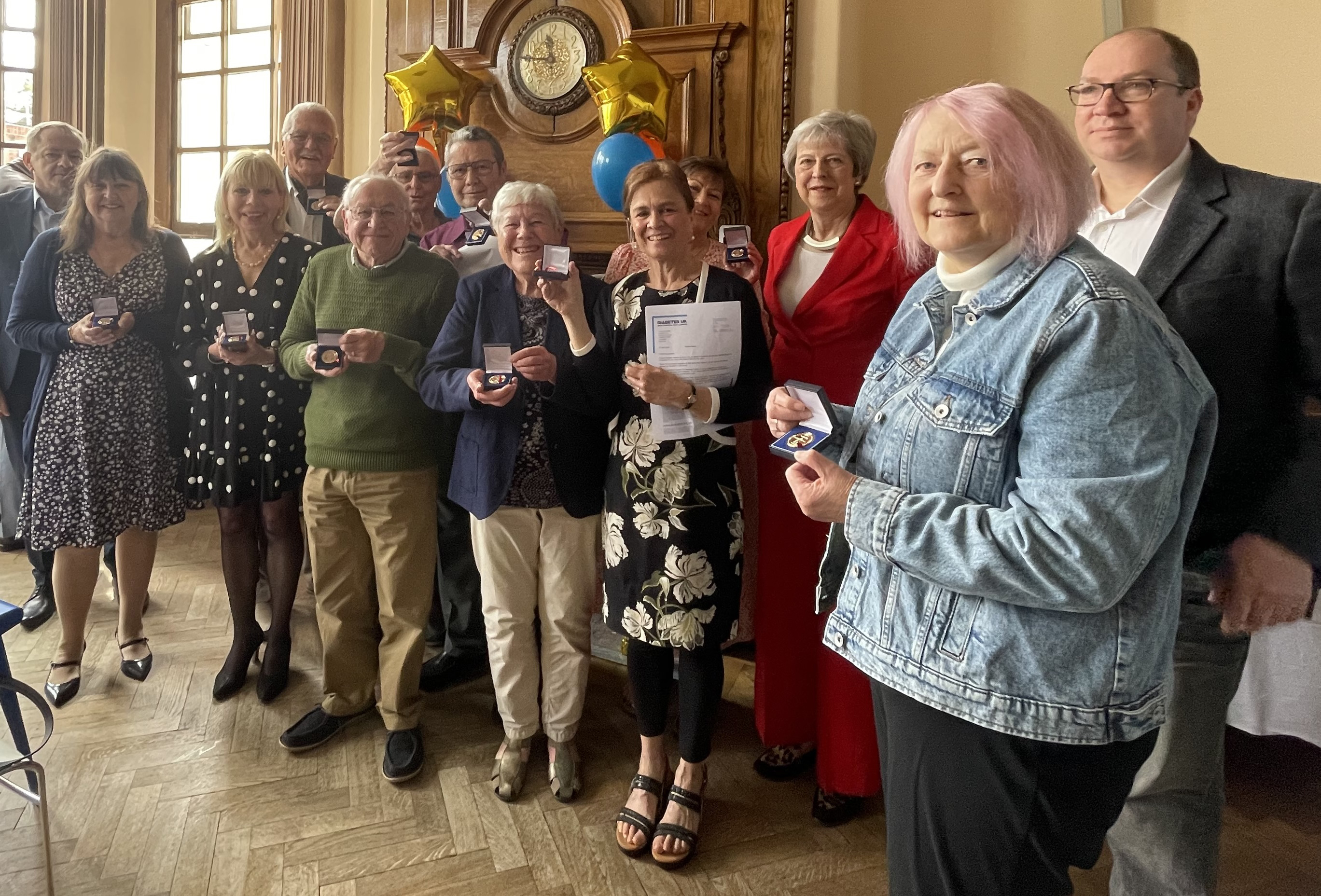 Group of patients with Theresa May MP