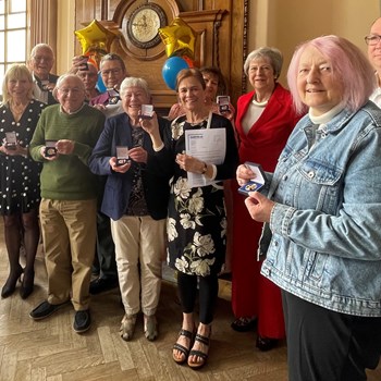 Group of patients with Theresa May MP