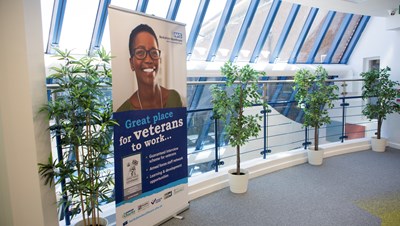 A picture of our veterans pop up banner in a hallway