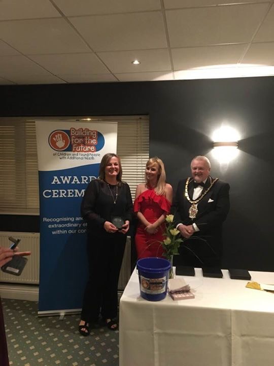 Serena Burgin receiving "Best Medical Professional Award" from John Kaiser, Mayor of Wokingham