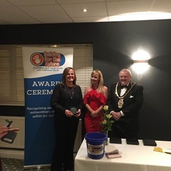 Serena Burgin receiving "Best Medical Professional Award" from John Kaiser, Mayor of Wokingham