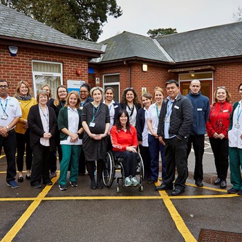 Photo of the team and Paralympian and service user Jeanette Chippington at the Abel Gardens clinic opening, after relocating from St Mark’s hospital in January