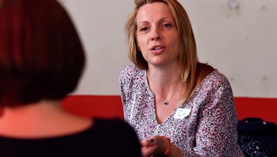 A mental health professional talking to someone