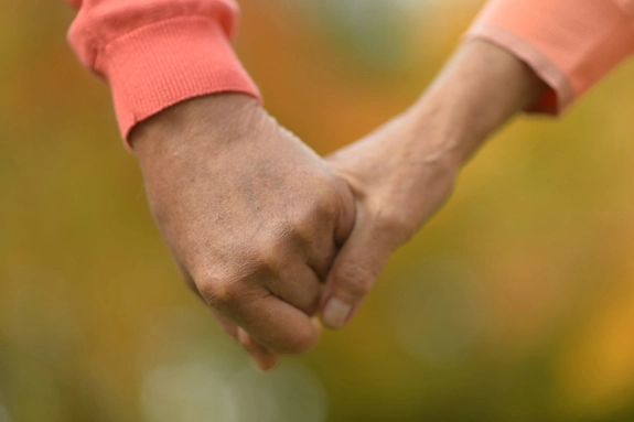Holding Hands Caring Carer