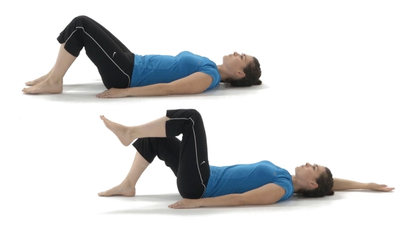 Person lying with knees bent and feet flat on the floor, arms by their sides, and then one arm is raised straight above their head and the opposite foot is lifted.