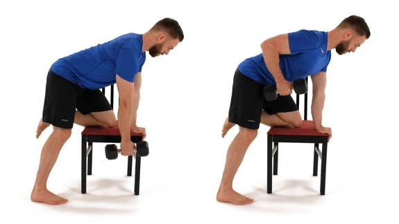 Person standing with one knee resting on the seat of a chair and a dumbbell in the opposite hand. They bring their elbow up from a straight position.