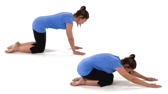 Person on hands and knees and then in a pose with bottom above their feet and chest above knees, arms stretched out in front.