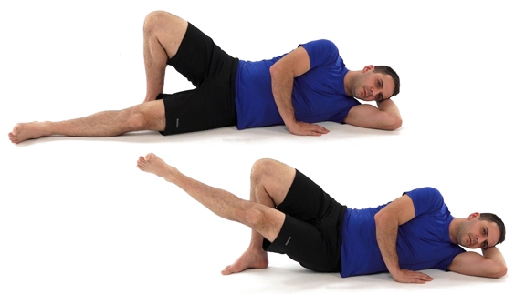 Person lying on their side with lower leg straight and other bent with foot flat on the floor, and then the lower leg is raised.