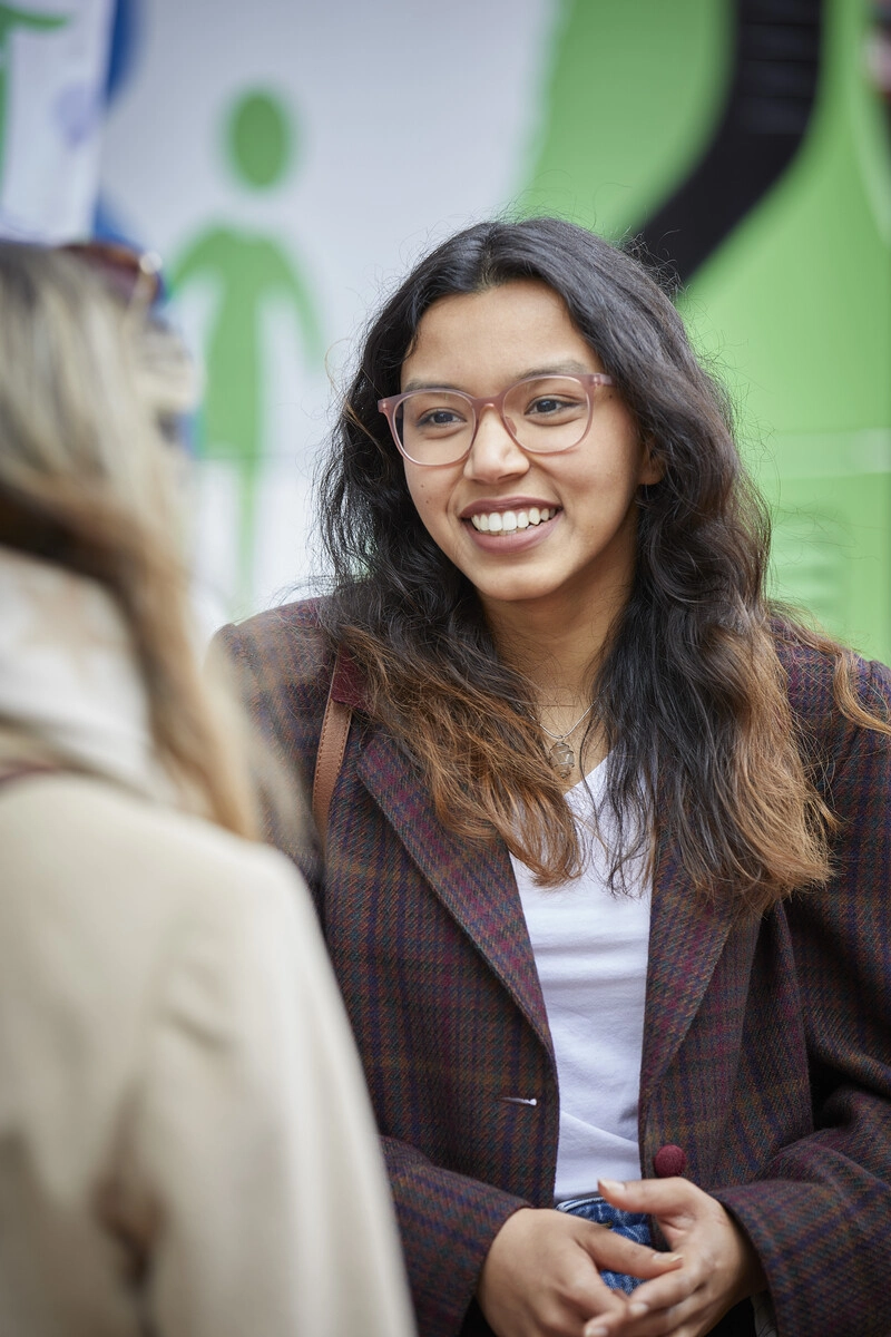 Woman in glasses smiling