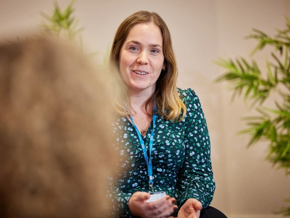 Female psychologist talking to someone