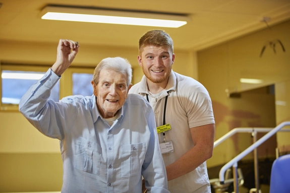Staff with elderly male patient