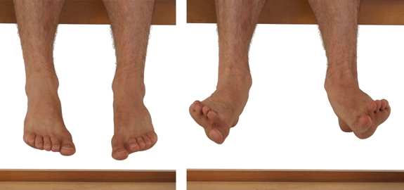 Feet hanging freely and turning outward