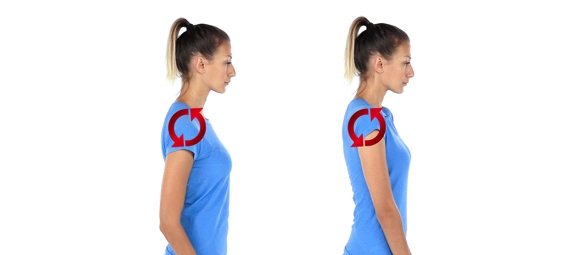 Person standing while lifting and rolling shoulders in a circular motion (as shown by arrows).
