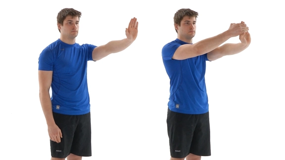 Person holding palm up with elbow straight and using the other hand to pull it back gently.