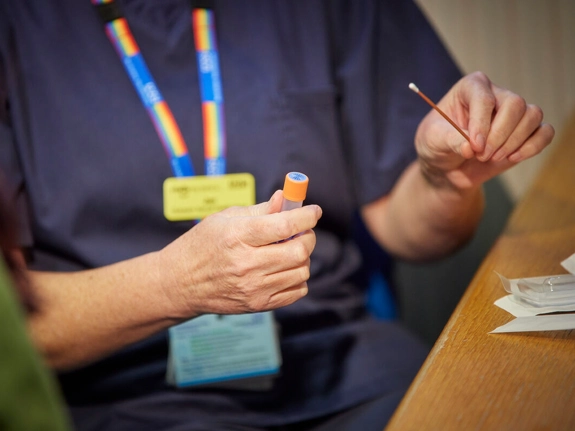 Test swab in a nurses hand