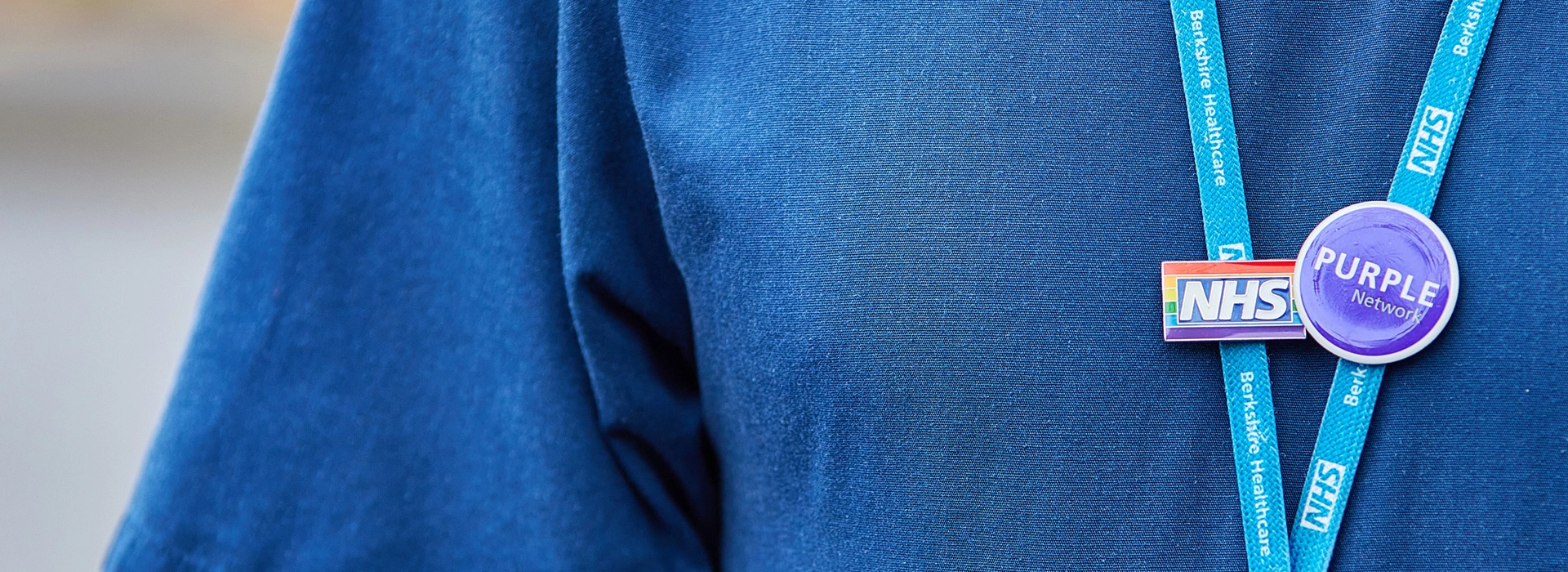 Berkshire Healthcare lanyard with Purple Network and Pride badges