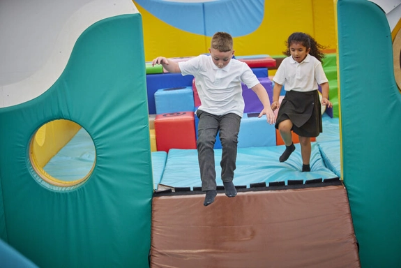 2 Children Jumping In Soft Play Centre
