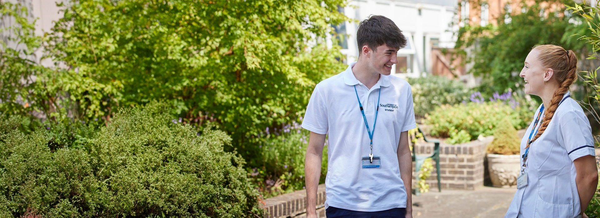 Physiotherapy student talking with placement supervisor